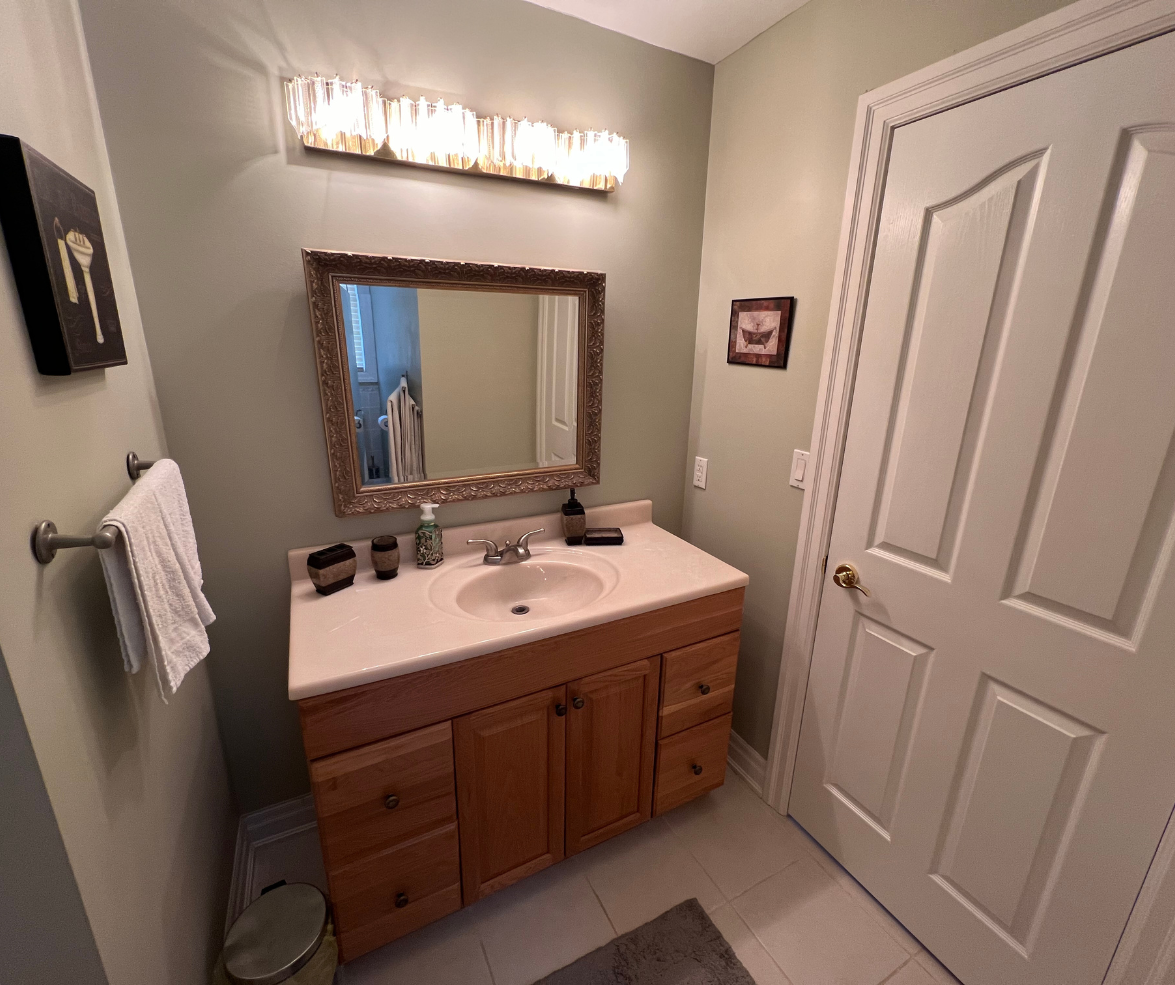 Elegant bathroom vanity with mirror and lighting