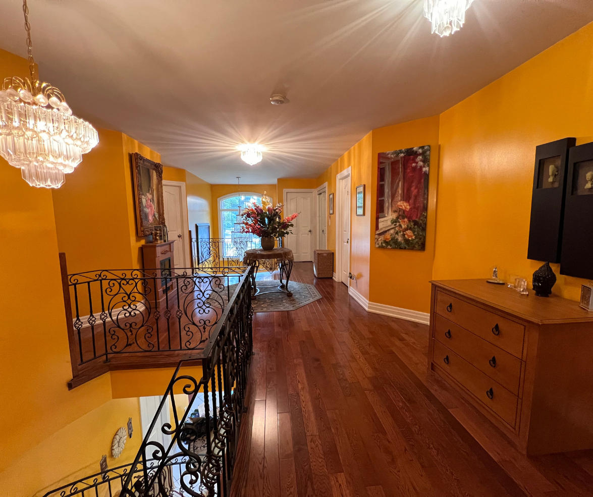 Elegant hallway with yellow walls